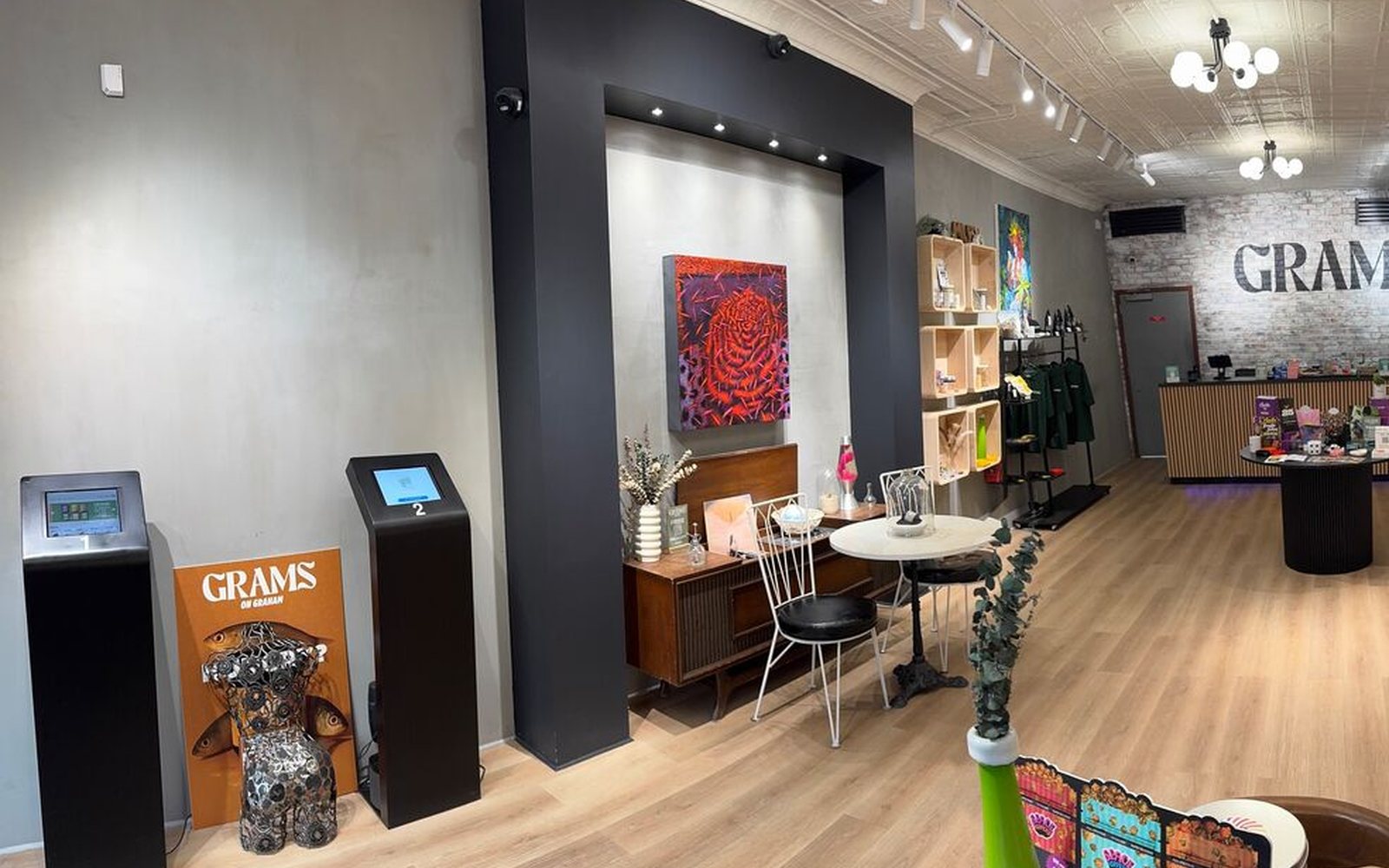 Entrance and ordering kiosks inside the licensed Grams shop in Brooklyn
